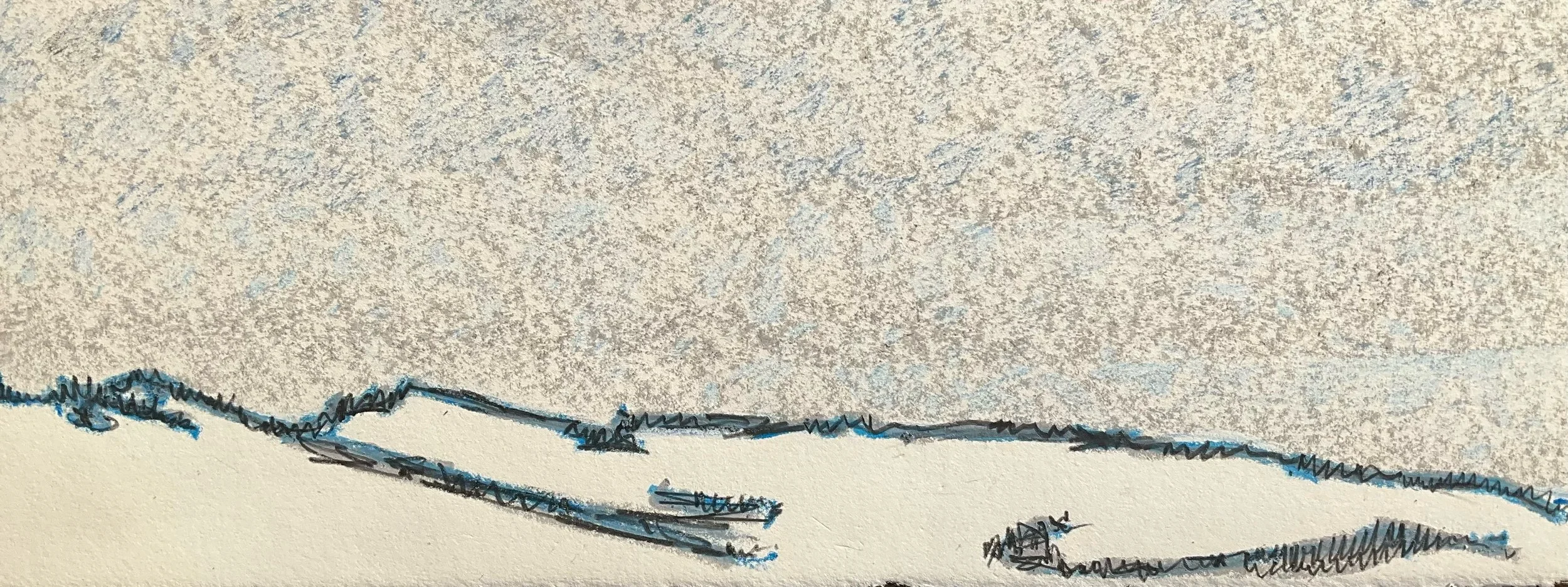 A hand drawing a mountain landscape with black ink on a textured background.