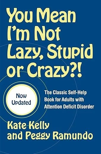 Book cover titled "You Mean I’m Not Lazy, Stupid or Crazy?!" by Kate Kelly and Peggy Ramundo, labeled as a classic self-help book for adults with Attention Deficit Disorder, now updated.