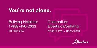 Pink background with white and purple text providing bullying helpline and chat online contact information.