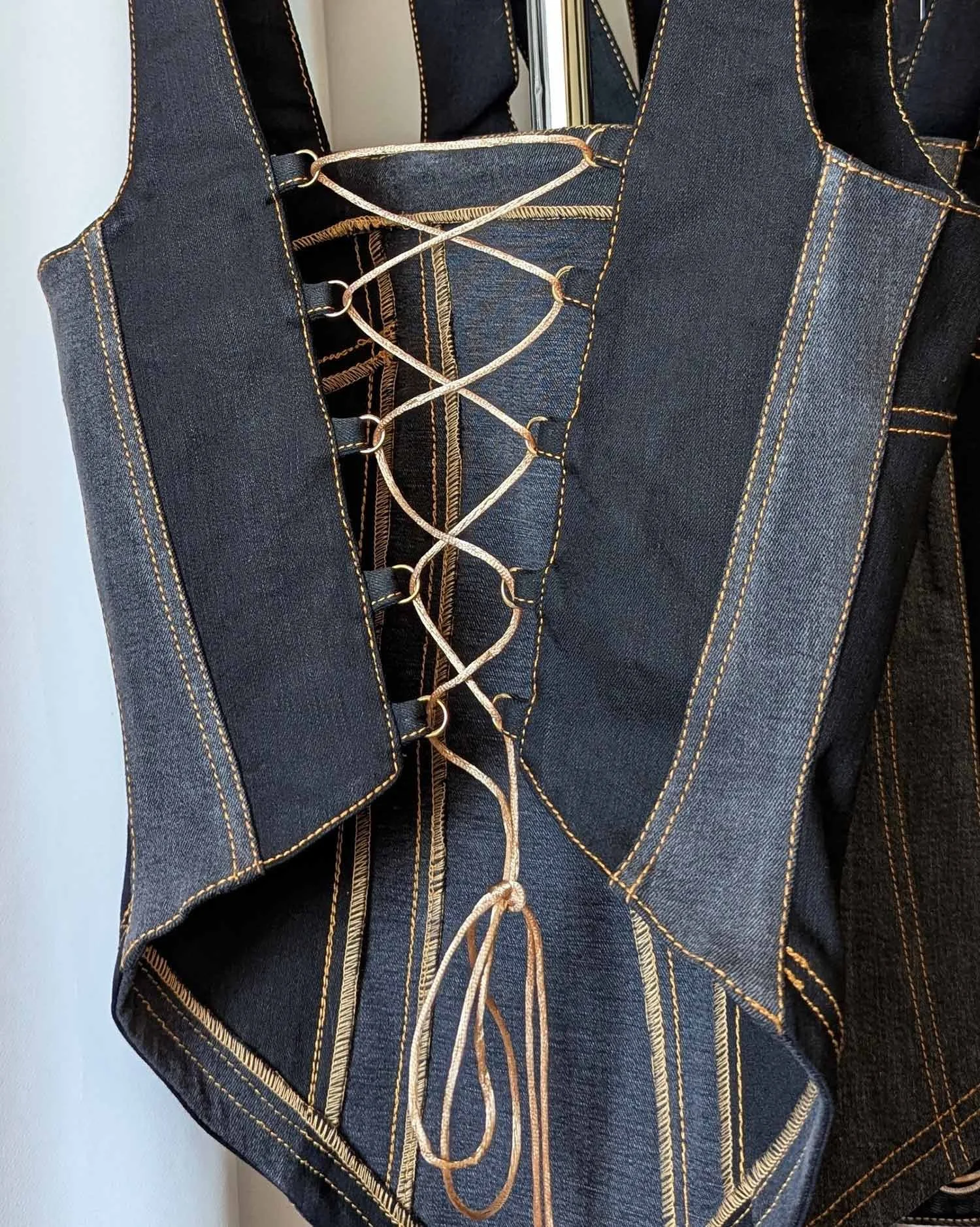 CLEA upcycled denim corset top black and golden 3.jpg