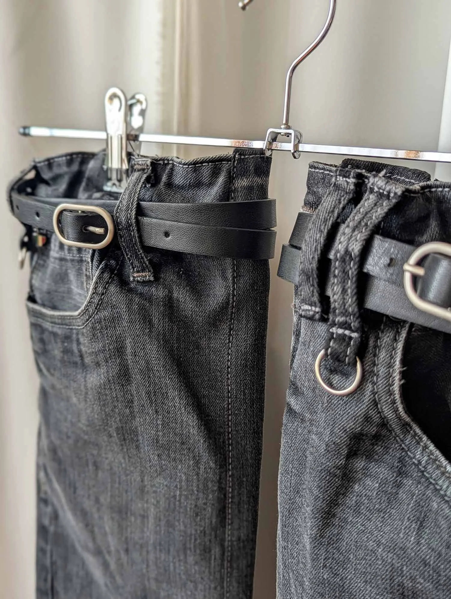 Straight-leg-upcycled-black-denim-leg-warmers-with-leather-belts-and-metallic-hardware-4.jpg