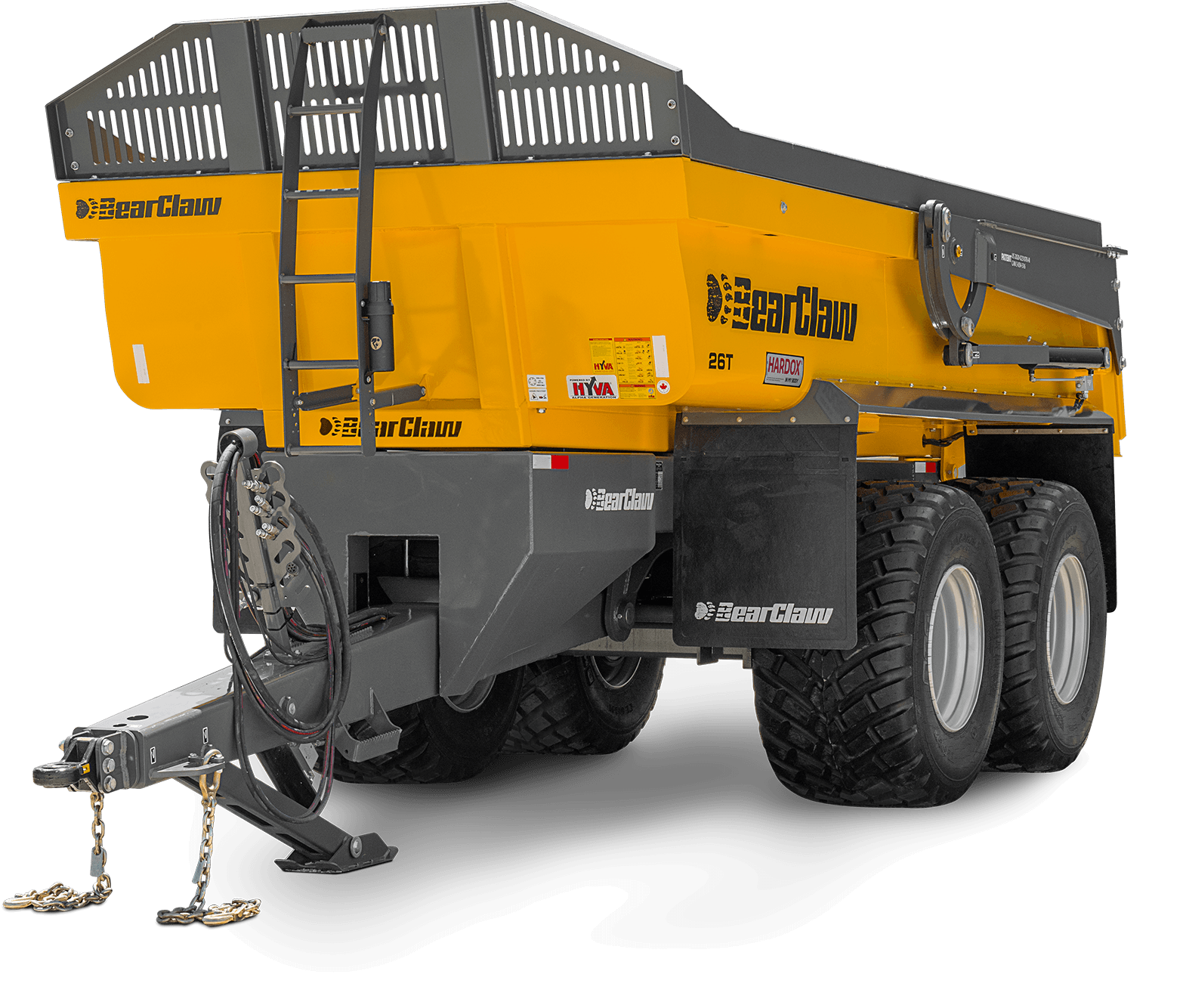 Yellow and gray BearClaw heavy equipment trailer with black tires and chains, isolated on black background.