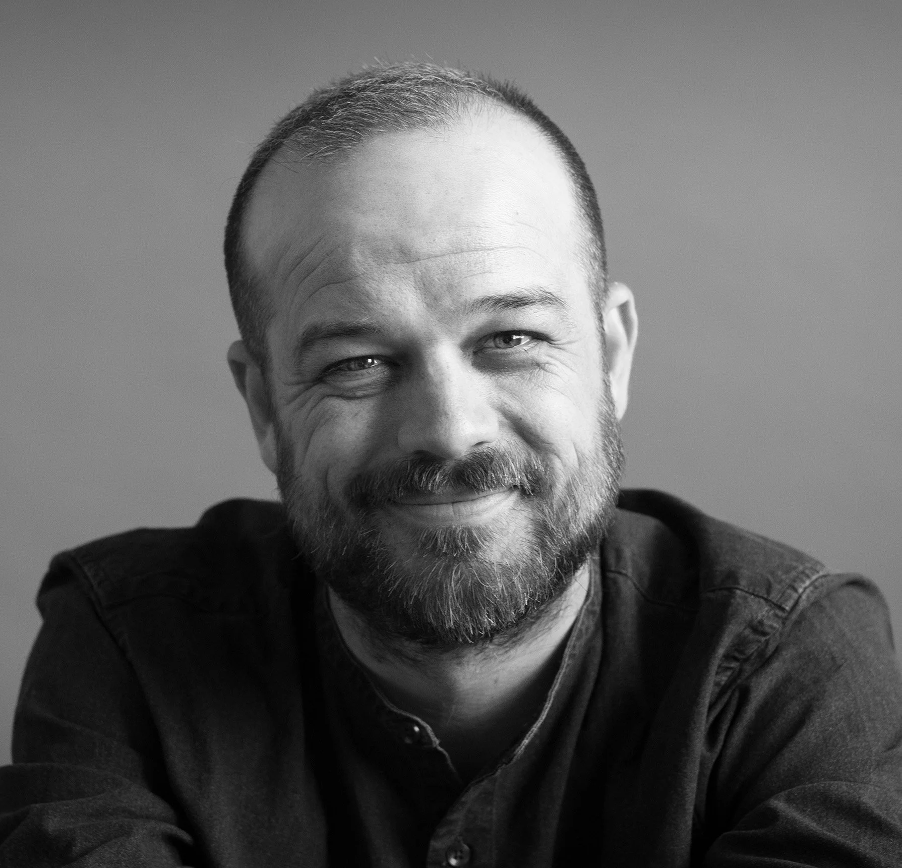 Commercial Director Stephen Frandsen smiling at camera.