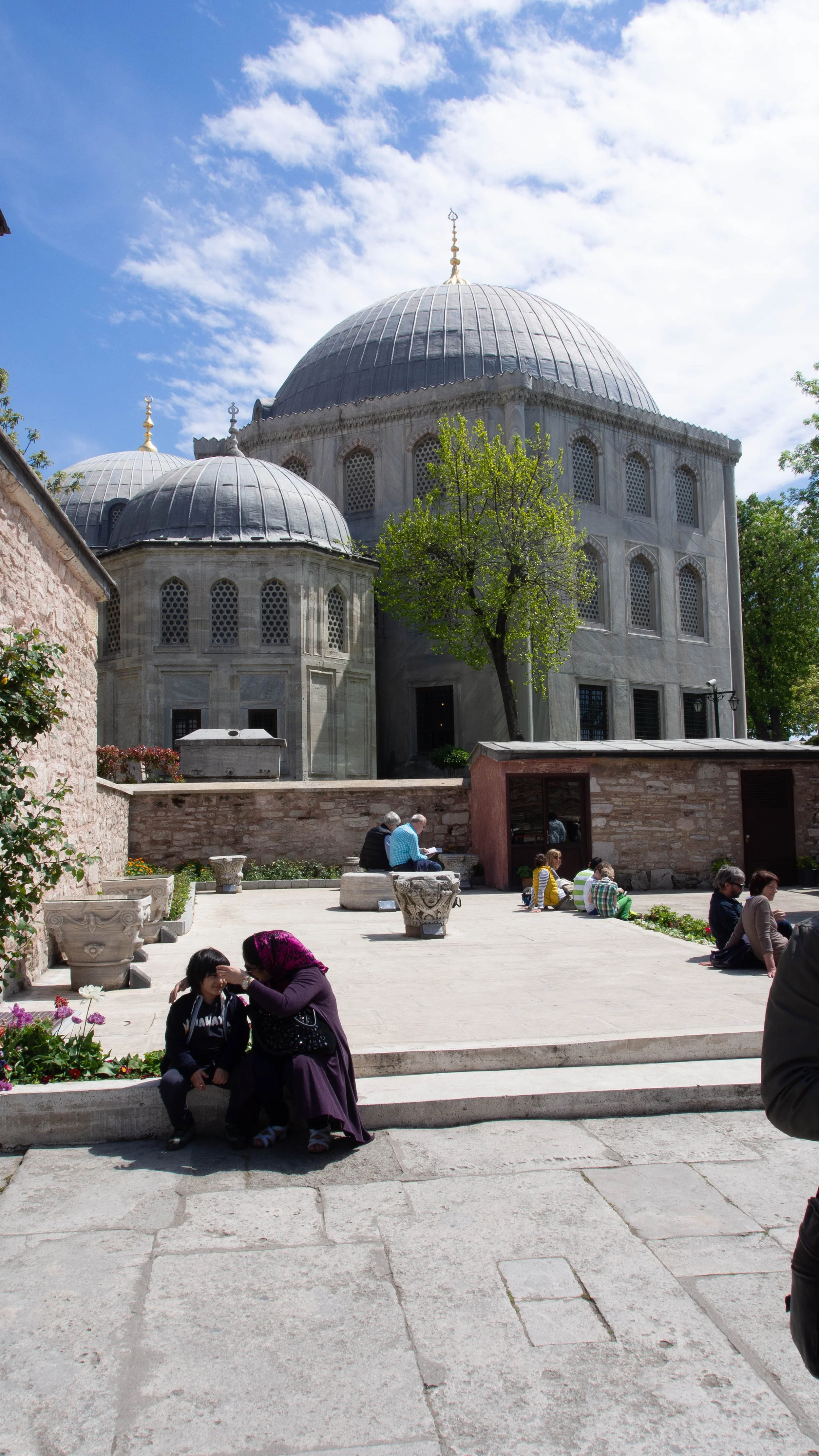 A grave yard at the back yard of a mosque