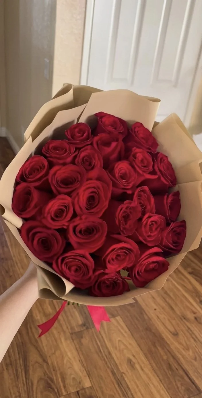 red-rose-kraft-wrapped-large-hand-tied-bouquet.jpg