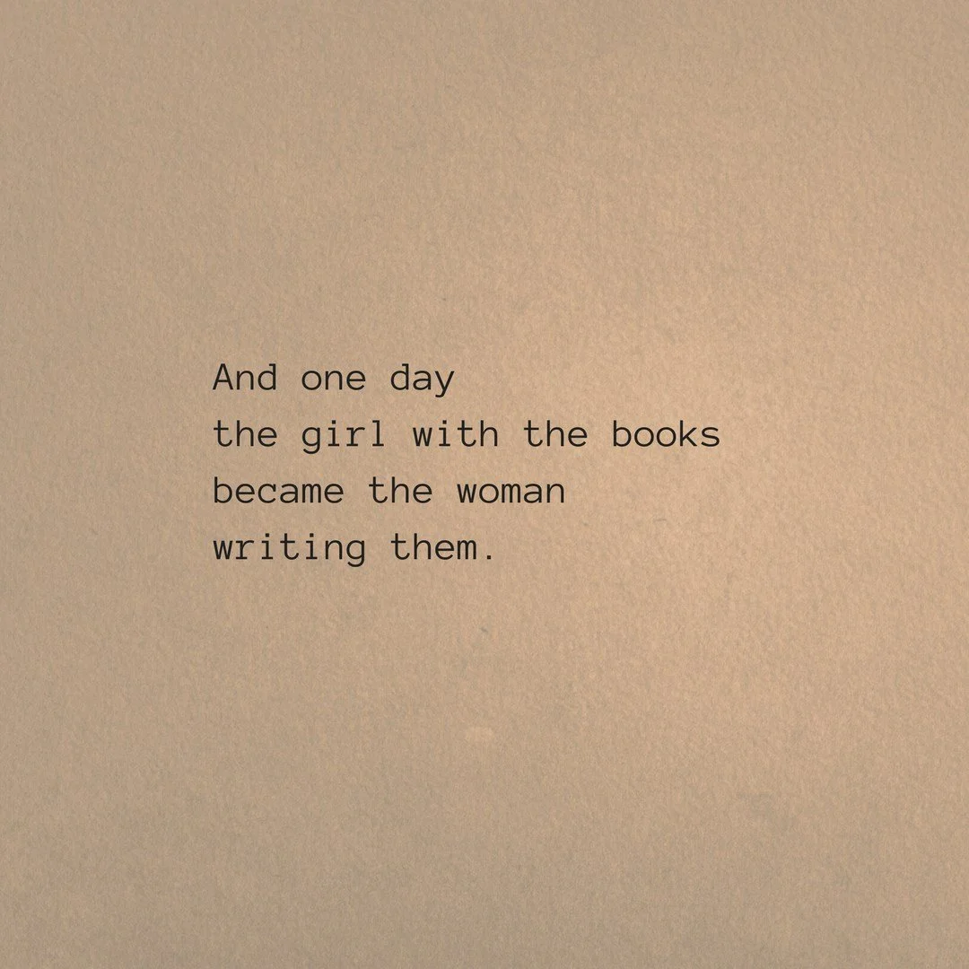 A beige background with black typewritten text that reads: 'And one day the girl with the books became the woman writing them.'