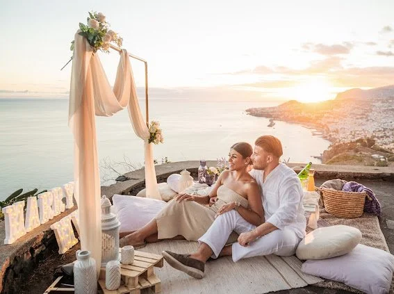 dream proposal setup at sunset in madeira with luxury picnic and professional photografer with drone