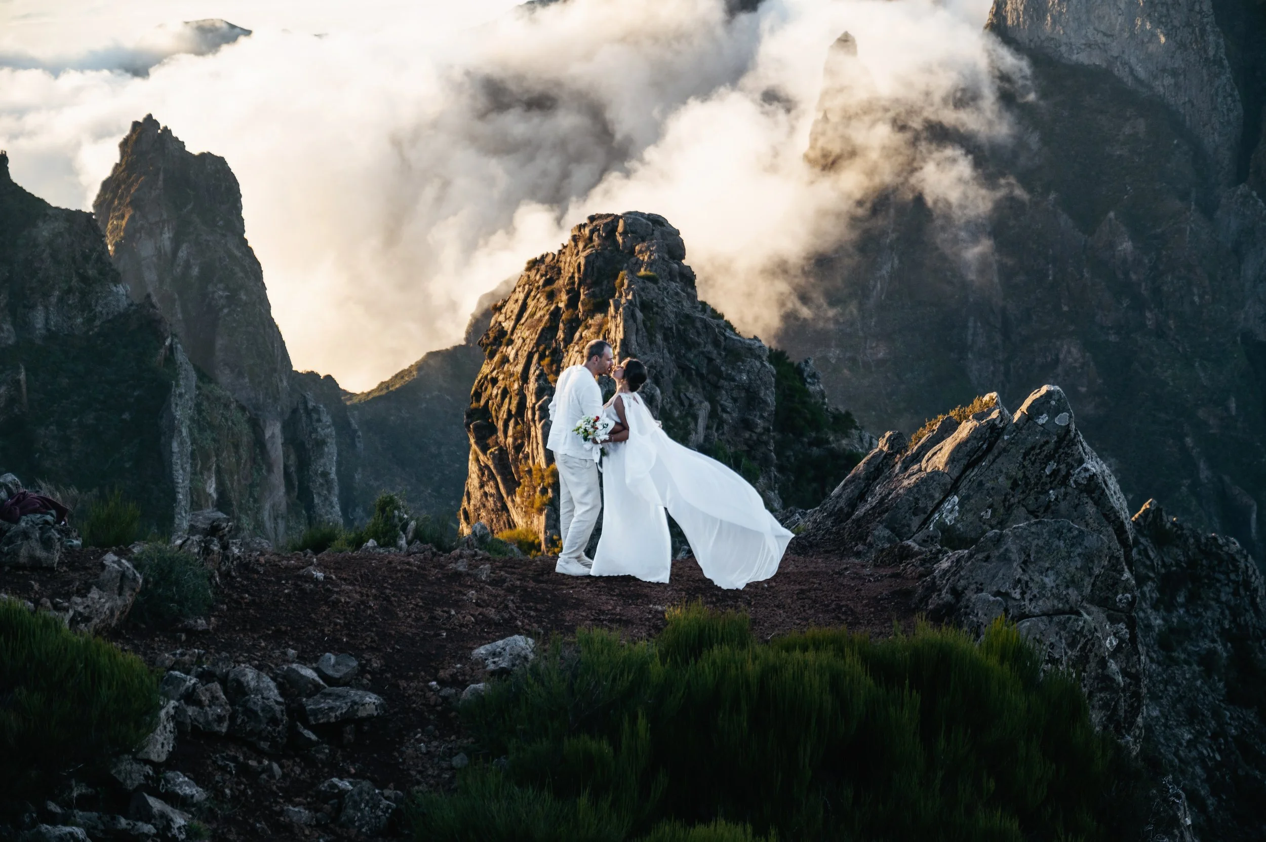 eloping couple in madeira on peak of mountain