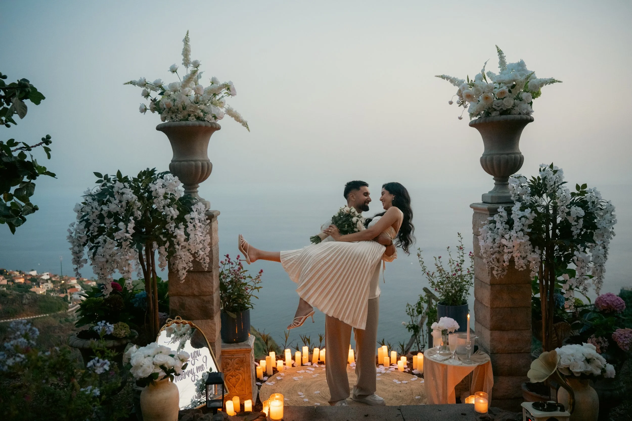 sunset proposal at dusk candle lights at the cliffside orchard by making memories madeira