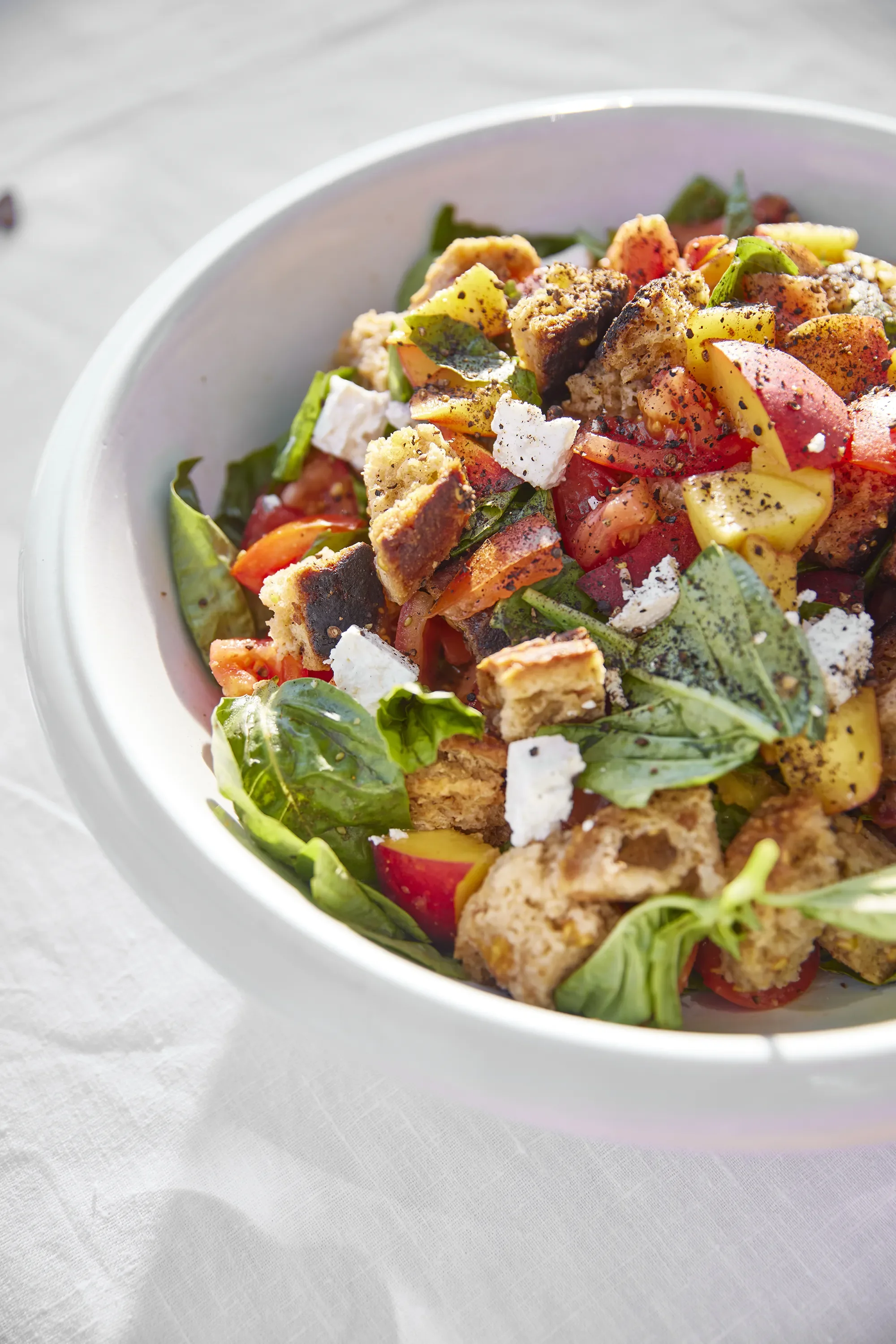 Fresh panzanella salad at Ojai Rôtie — organic tomatoes, sourdough croutons, and seasonal vegetables
