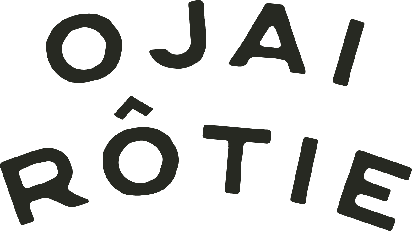 Text that reads 'O JAI FROM THE' arranged in a circular pattern.