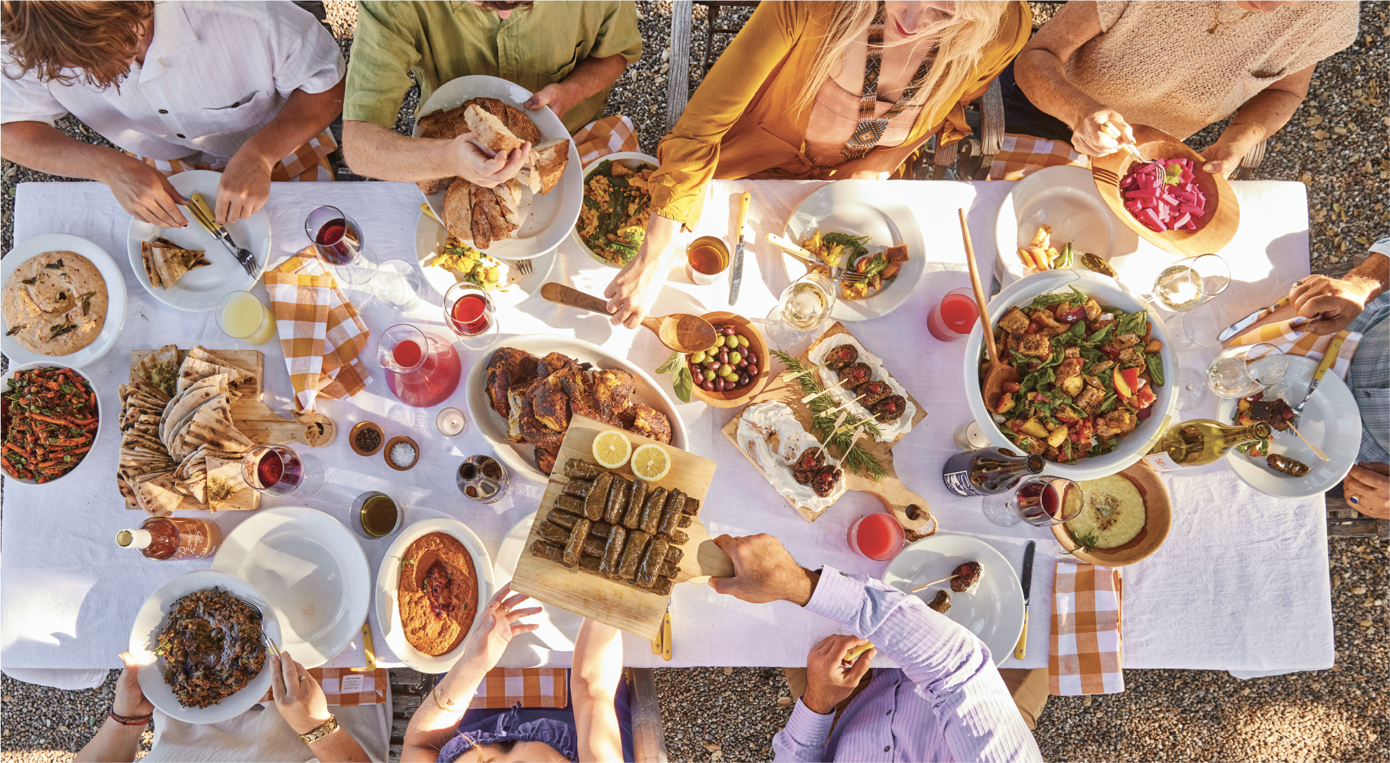 Ojai Rôtie catering spread — rotisserie chicken, sides, and Lebanese-French picnic fare served at an outdoor event