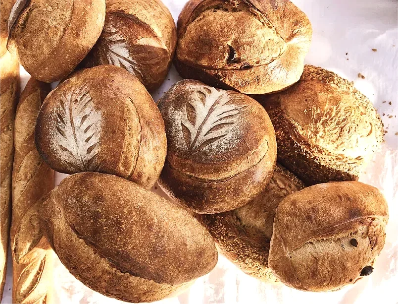 Freshly baked sourdough boules at Ojai Rôtie — made with a 20-year-old starter, organic wheat, spelt, and rye, Ojai California