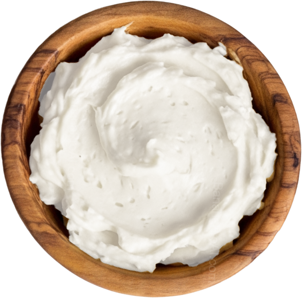 Whipped cream in a wooden bowl.