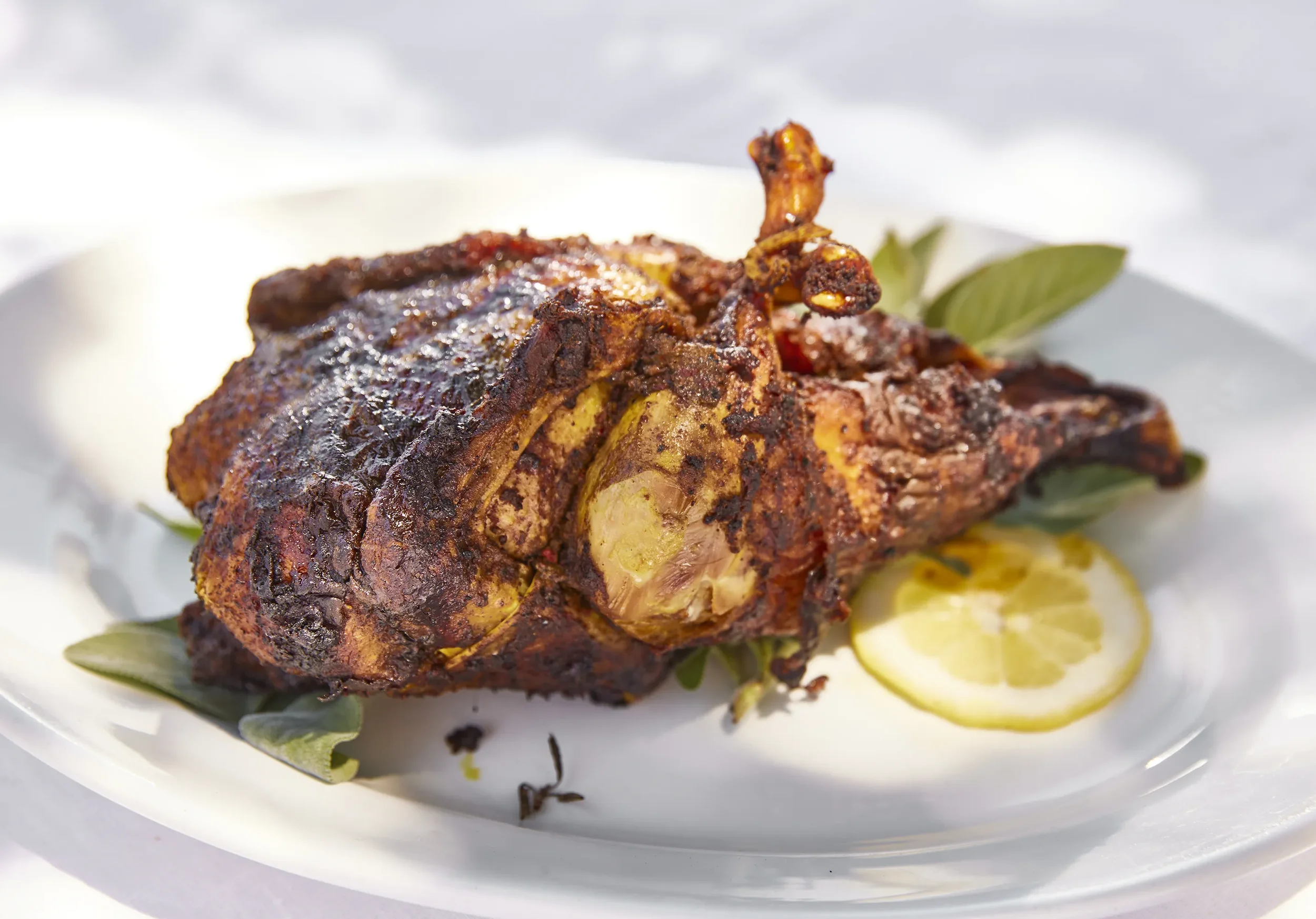 Rotisserie chicken at an Ojai Rôtie catering event — pasture-raised, seasoned with house spice blend