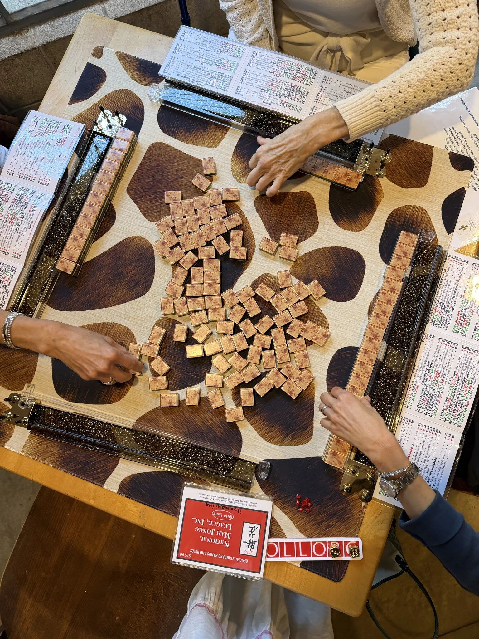 then the tiles hit the table