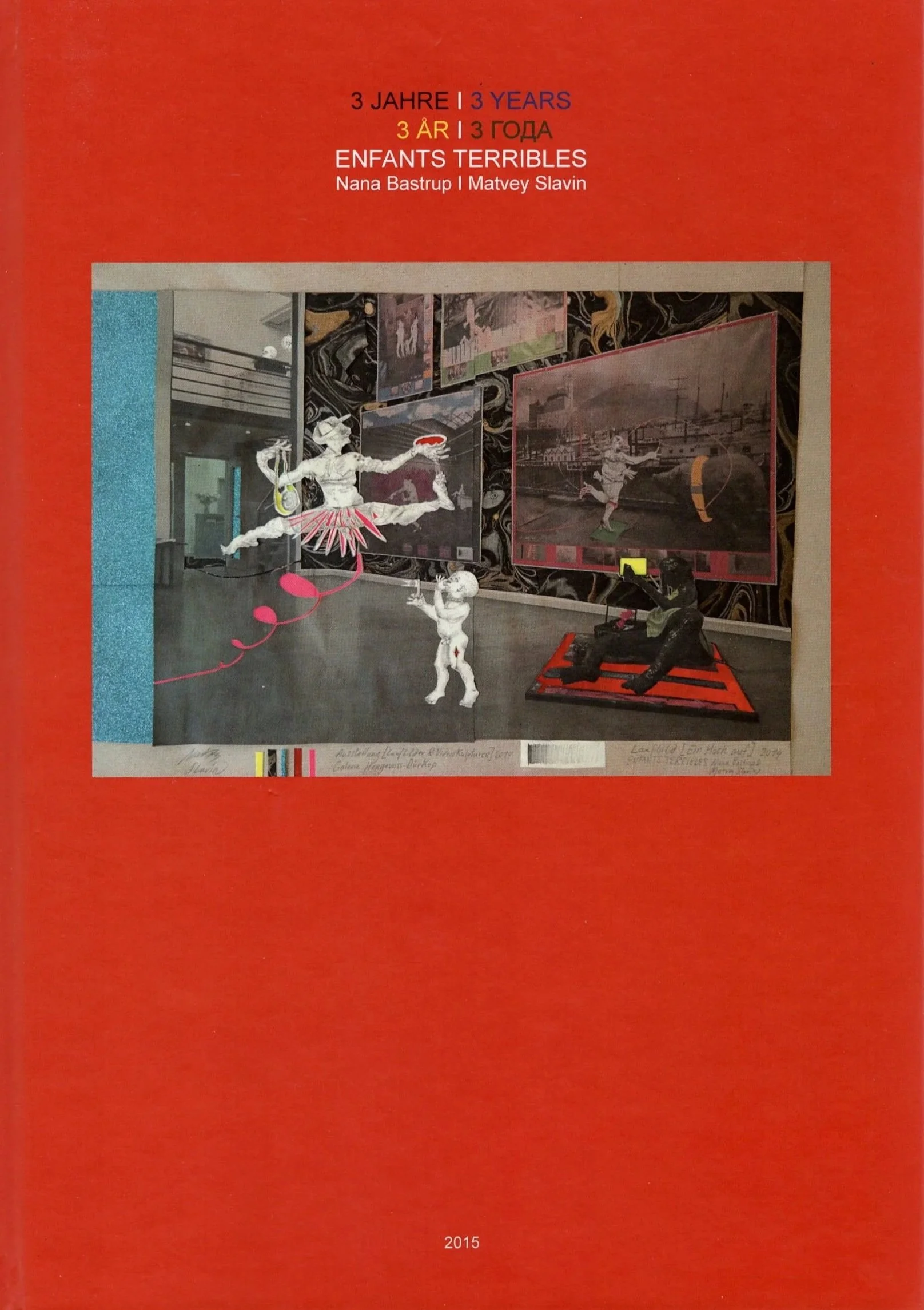 A red cover book titled '3 Jahre | 3 Years | 3 ÅR | Enfants Terribles' with the authors Nana Bastrup and Matvey Slavin. The cover features a collage of photographic artwork with figures and scenes, including a ballerina, a person in a green outfit, and a black dog sculpture, set against a dark, patterned background.