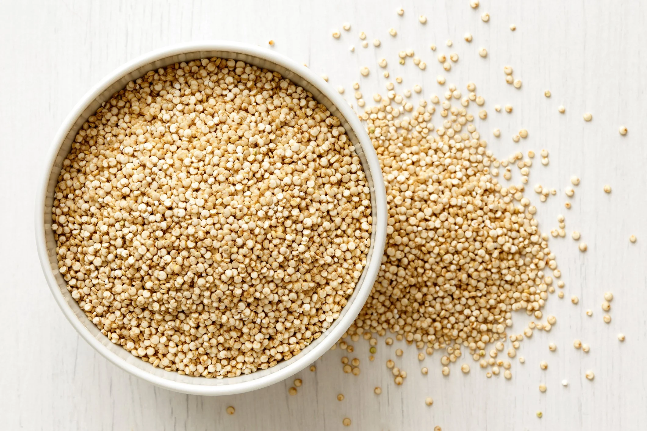 bowl of white quinoa for paella