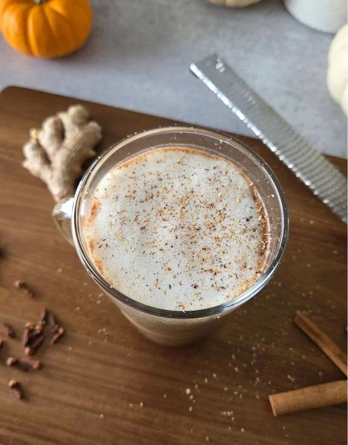 pumpkin spice latte with grated nutmeg