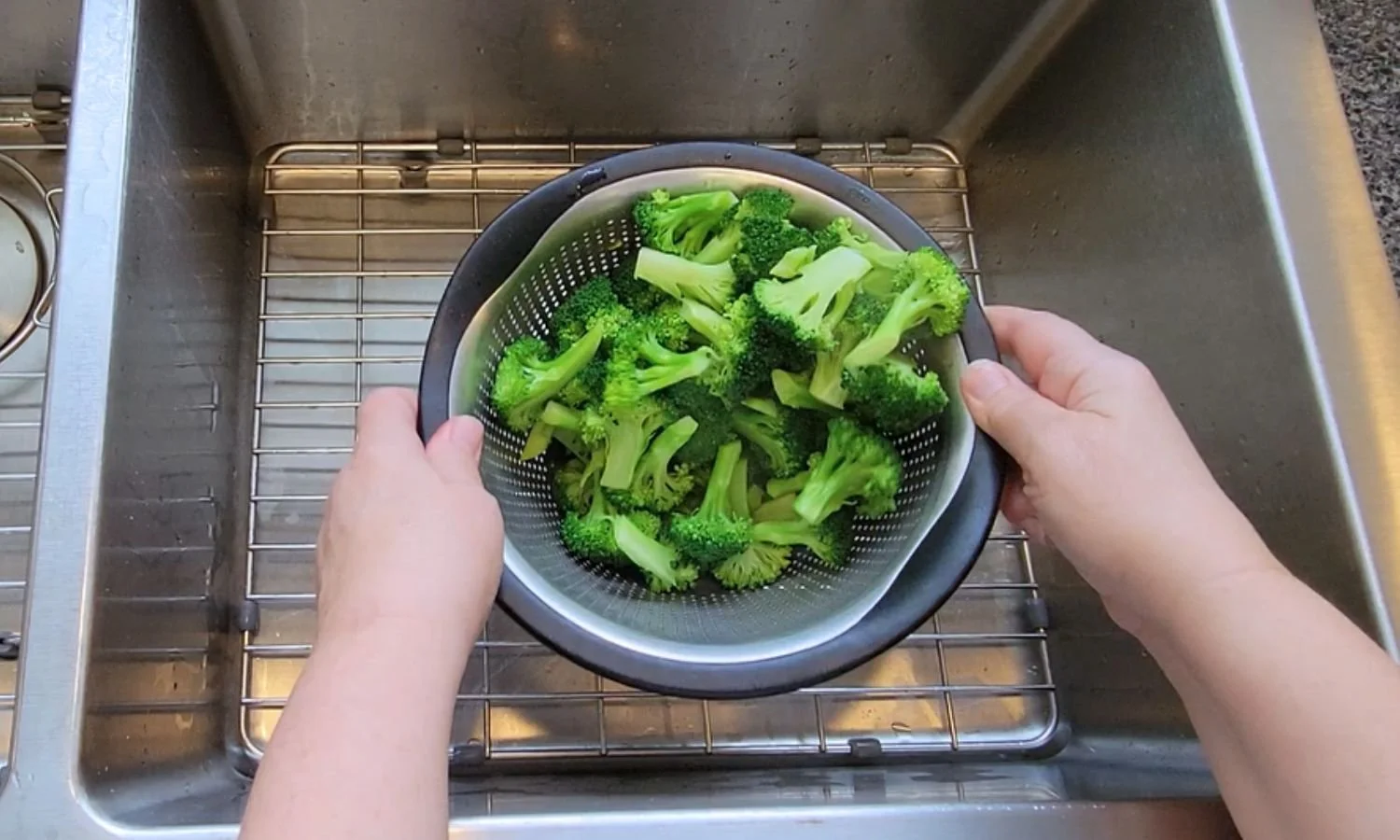 blanched broccoli in colander