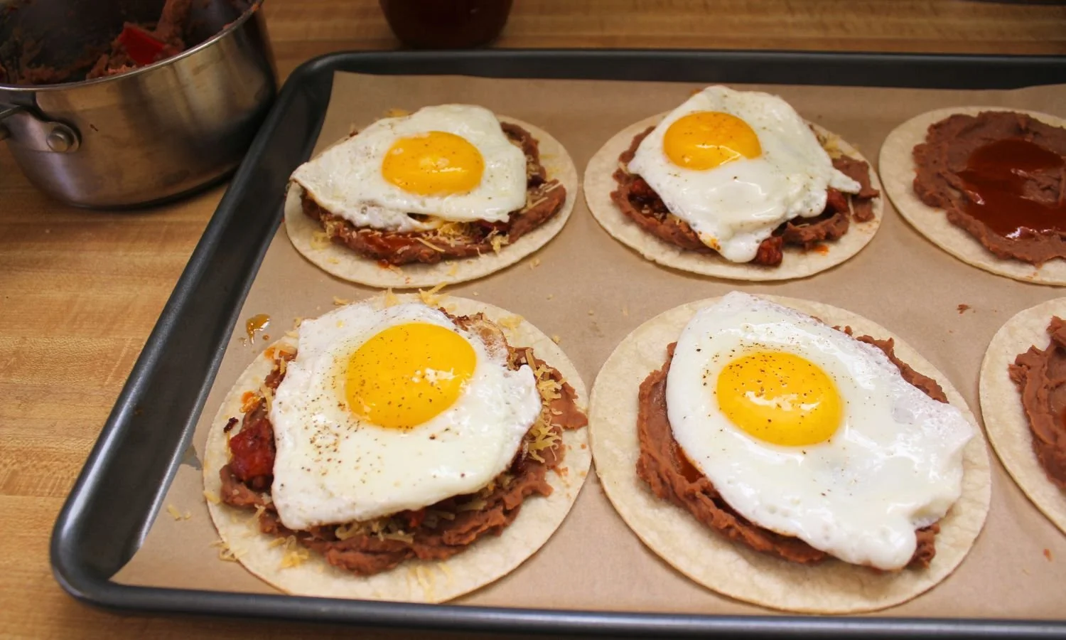 individual huevos rancheros on sheet tray