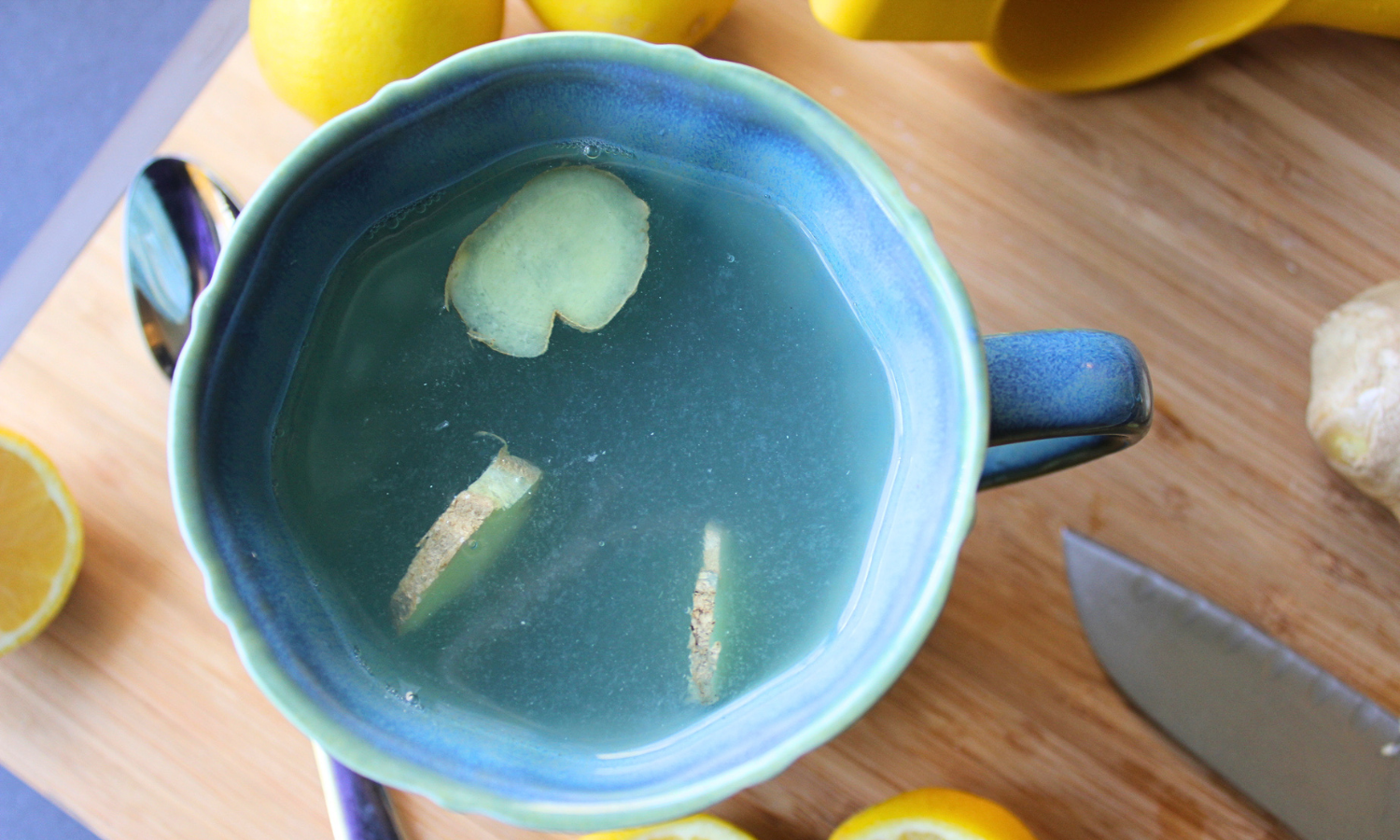 Ginger in lemon water mug