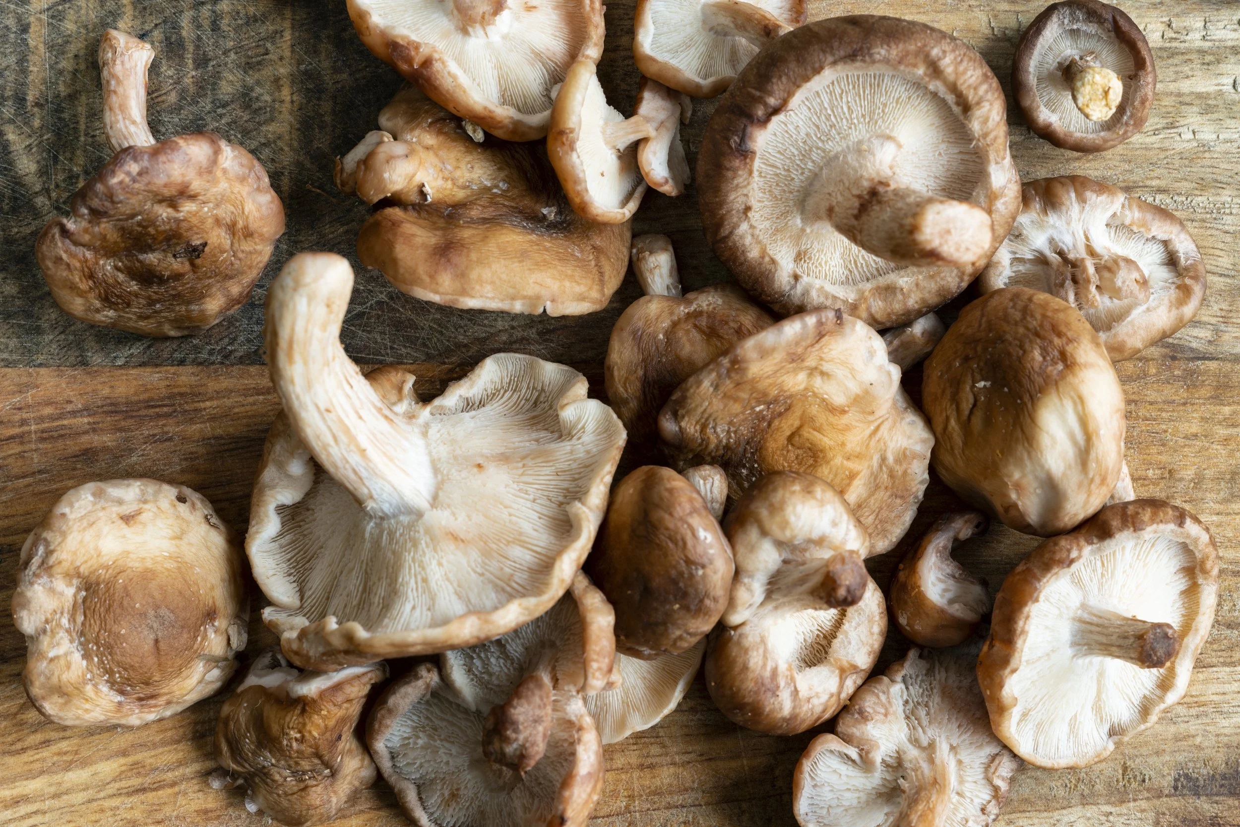 shiitake mushrooms on cutting board for liver pate