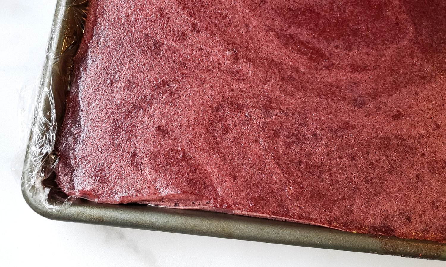 homemade berry gelatin cooled in pan