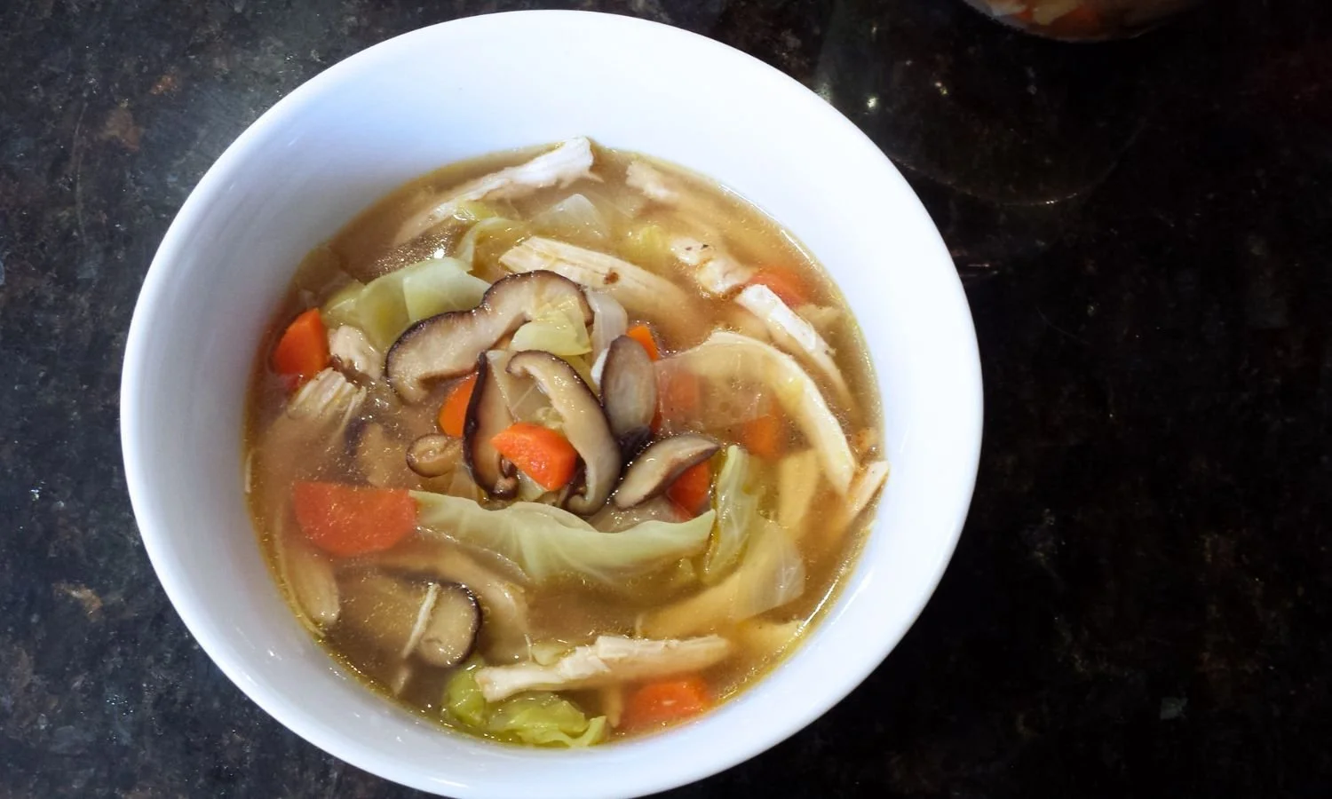 healing chicken soup in bowl