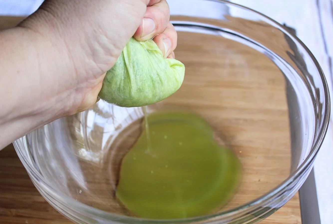 grated zucchini in towel remove water