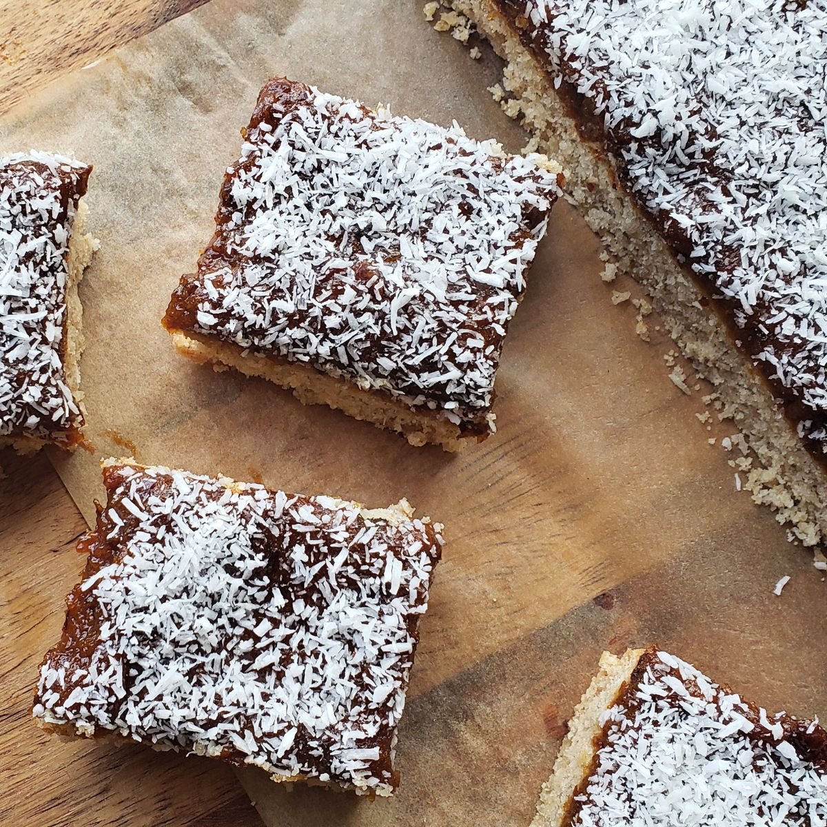 Apricot and plum bars on cutting board