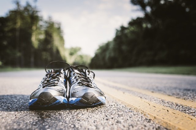 running shoes on street