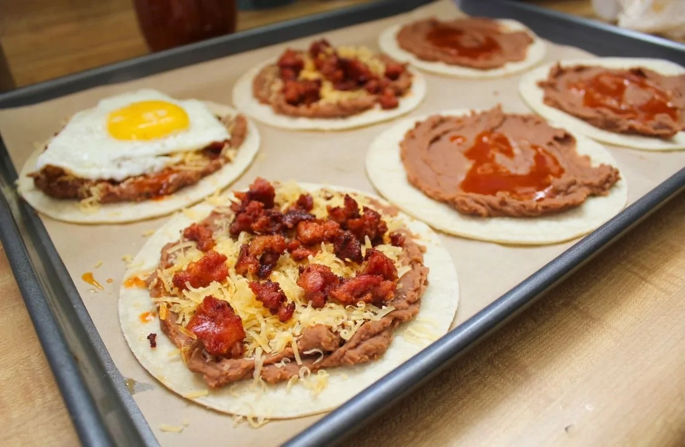 assembling individual huevos rancheros