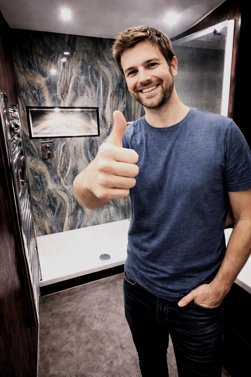 Happy client after modern bathroom renovation completed in Manchester