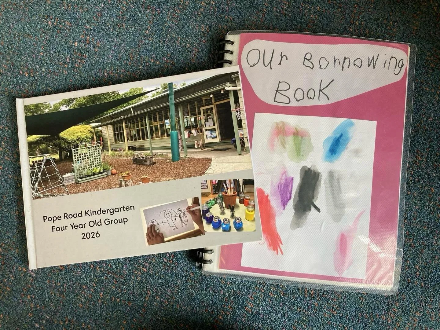 A recent project for children this term has been the creation of borrowing books.

One book includes photos, and a painted or drawn image to accompany a story from each child. Another is a social story, reflecting daily life at kindergarten. These ha