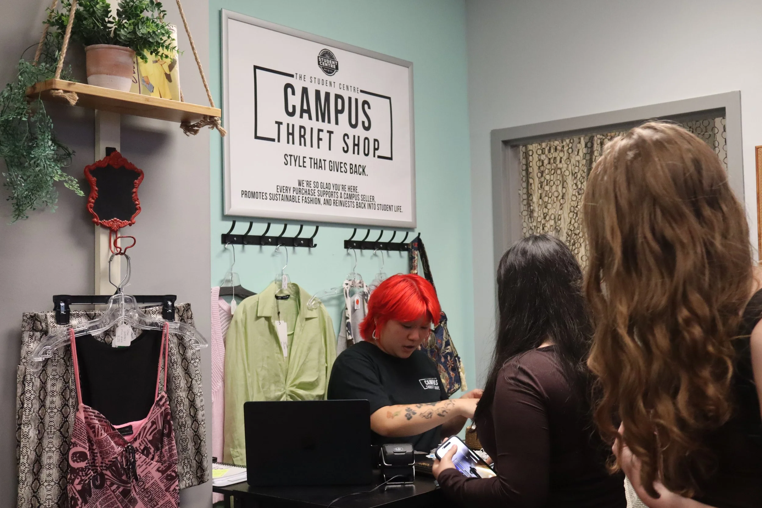  Students complete their purchases at the Campus Thrift Shop, Sept. 28, 2026.  | Arran Christie / LANCE 