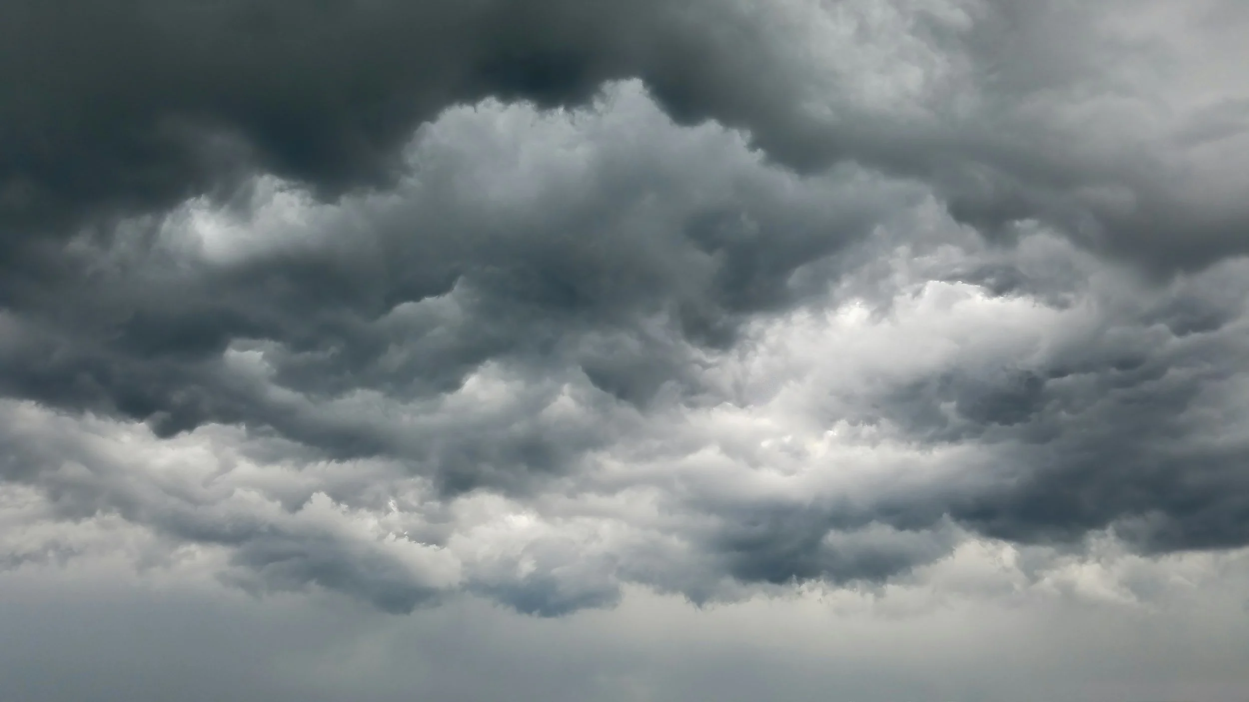 Dark, ominous storm clouds in the sky