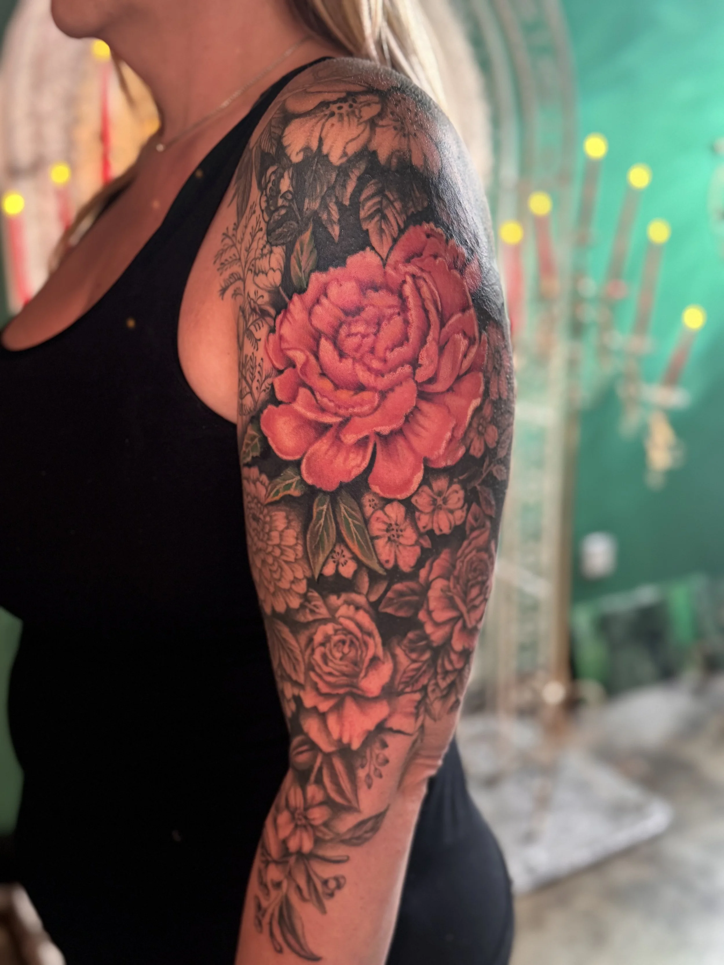 Realistic floral sleeve with a variety of flowers