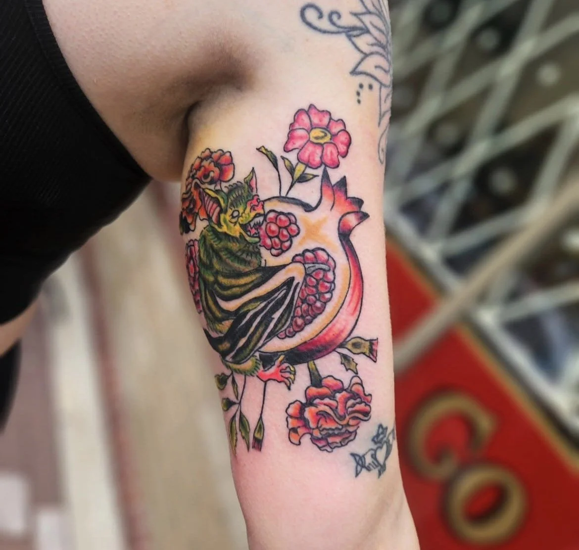 neon colored neo tradition bat and pomegrate