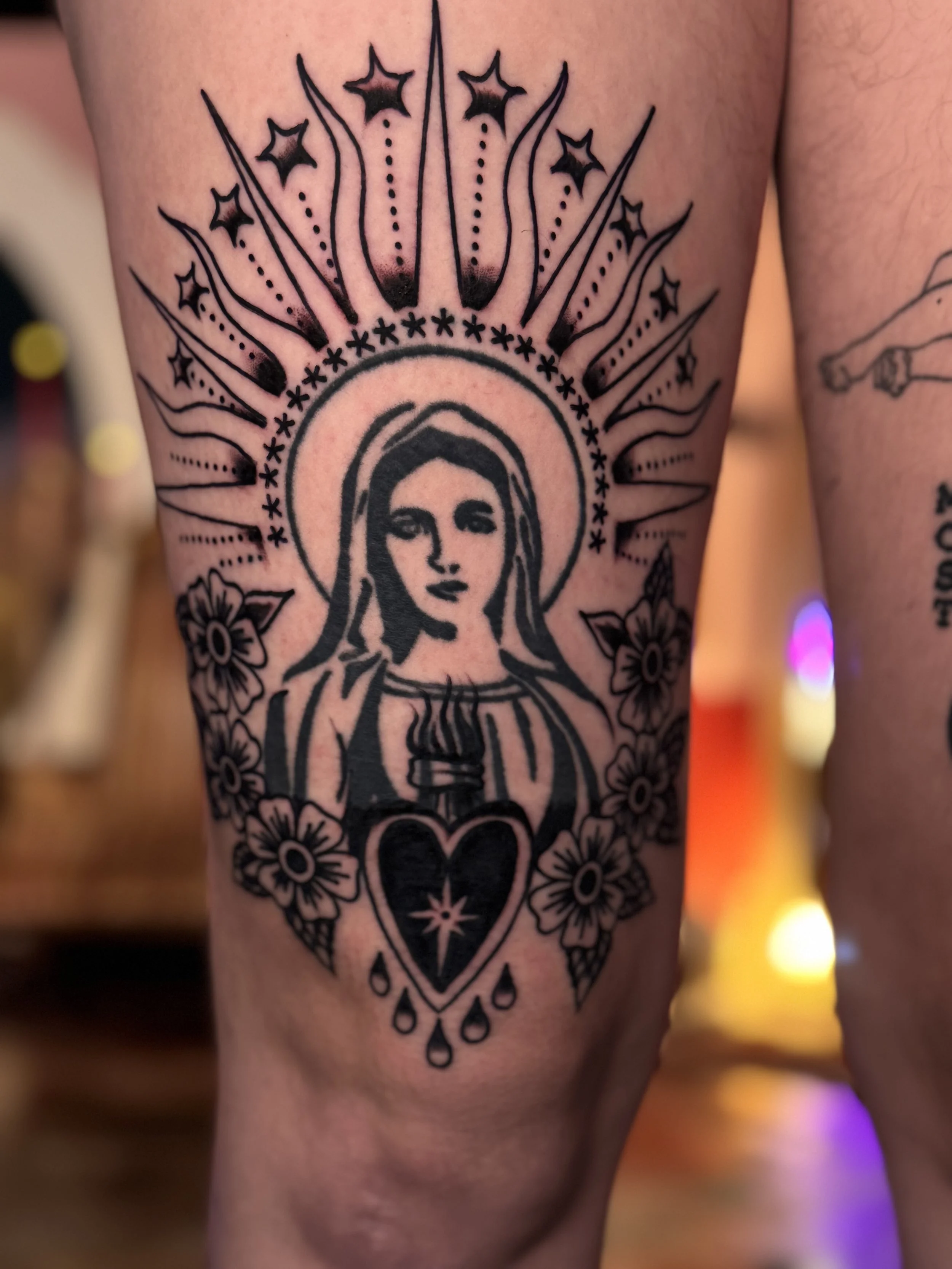 revamped an old virgin mary tattoo
