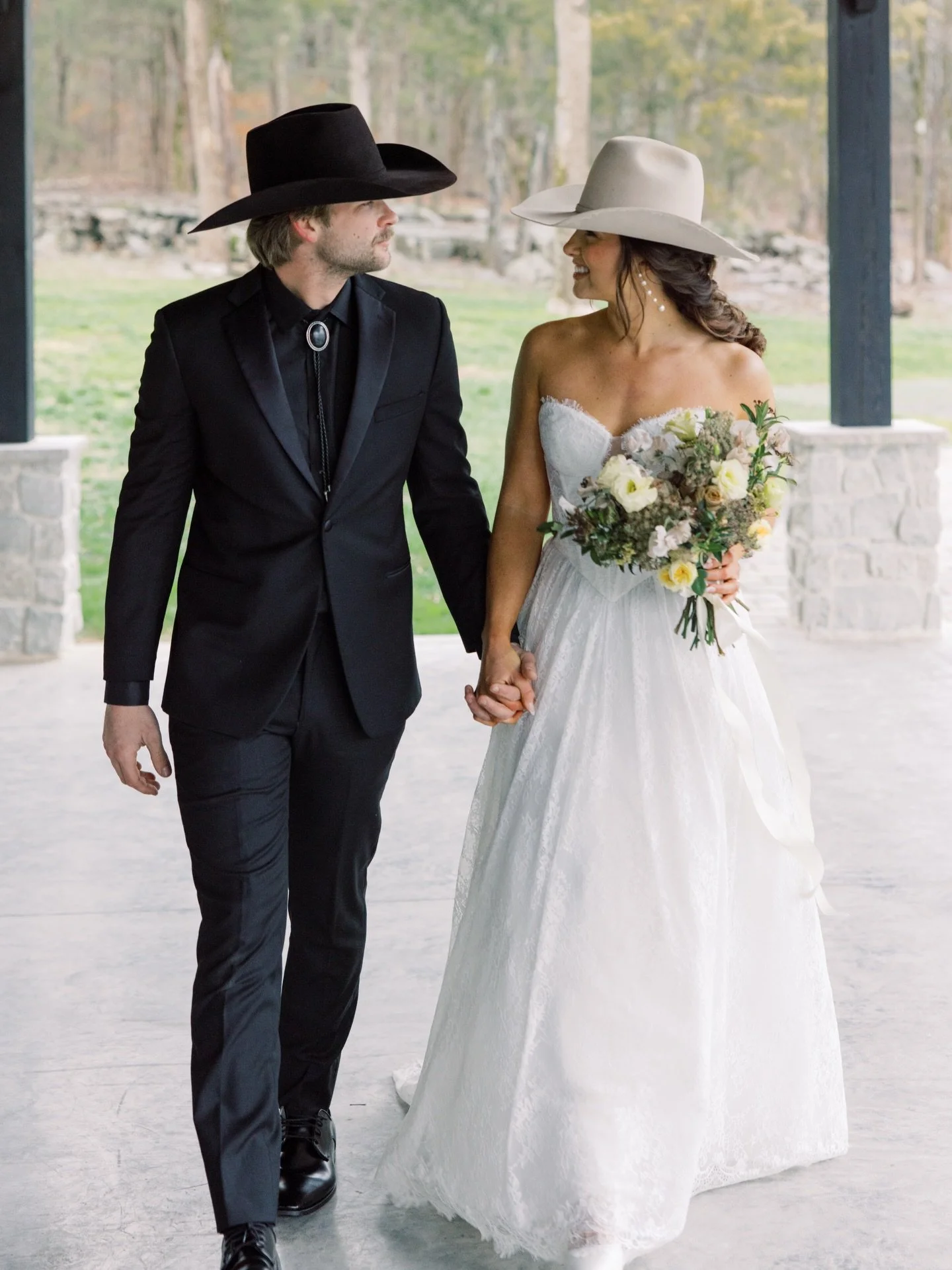 It&rsquo;s Nashville, after all! 
Cowboy hats + the sweetest couple. 
.
. 
Photography: @grace.ann.gilbert / @lverphoto 
Venue: @saddlewoodsfarm 
Event Rentals &amp; Styling: @grandtentsandevents
Wedding Content Creation: @itschampagnesocial 
Florals