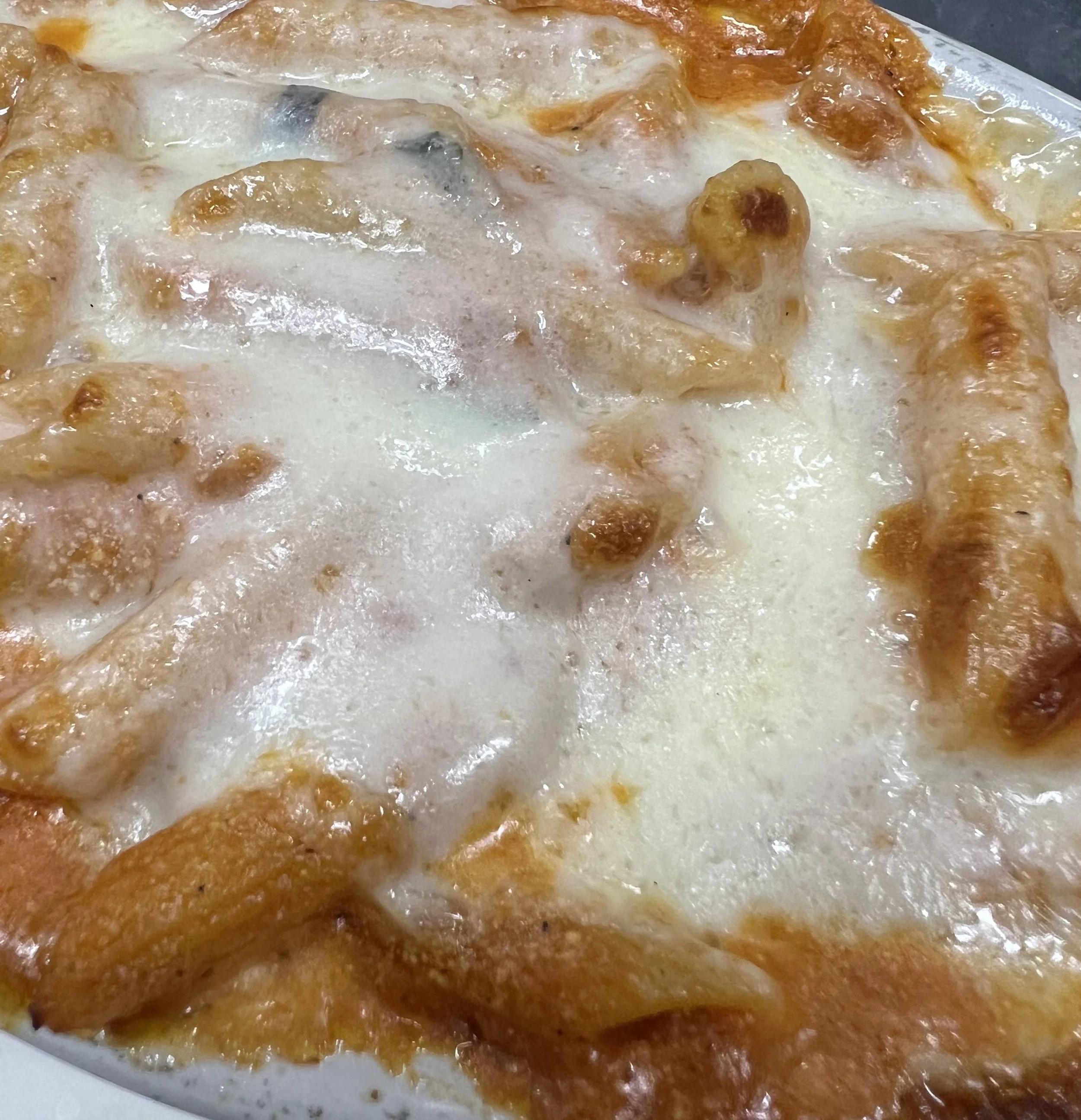 Close-up of a pepperoni pizza with melted cheese.