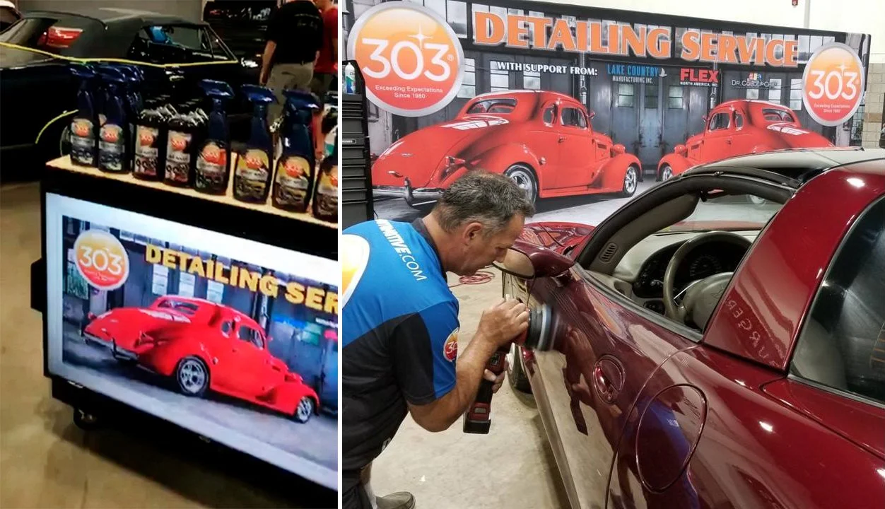 Ein Mann poliert ein rotes Auto bei einem Autopflegeservice, im Hintergrund sind weitere rote Autos und ein Schild mit "Detailing Service".