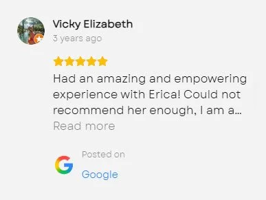 Screenshot of a Google review by Vicky Elizabeth giving five stars and praising Erica for an empowering experience.