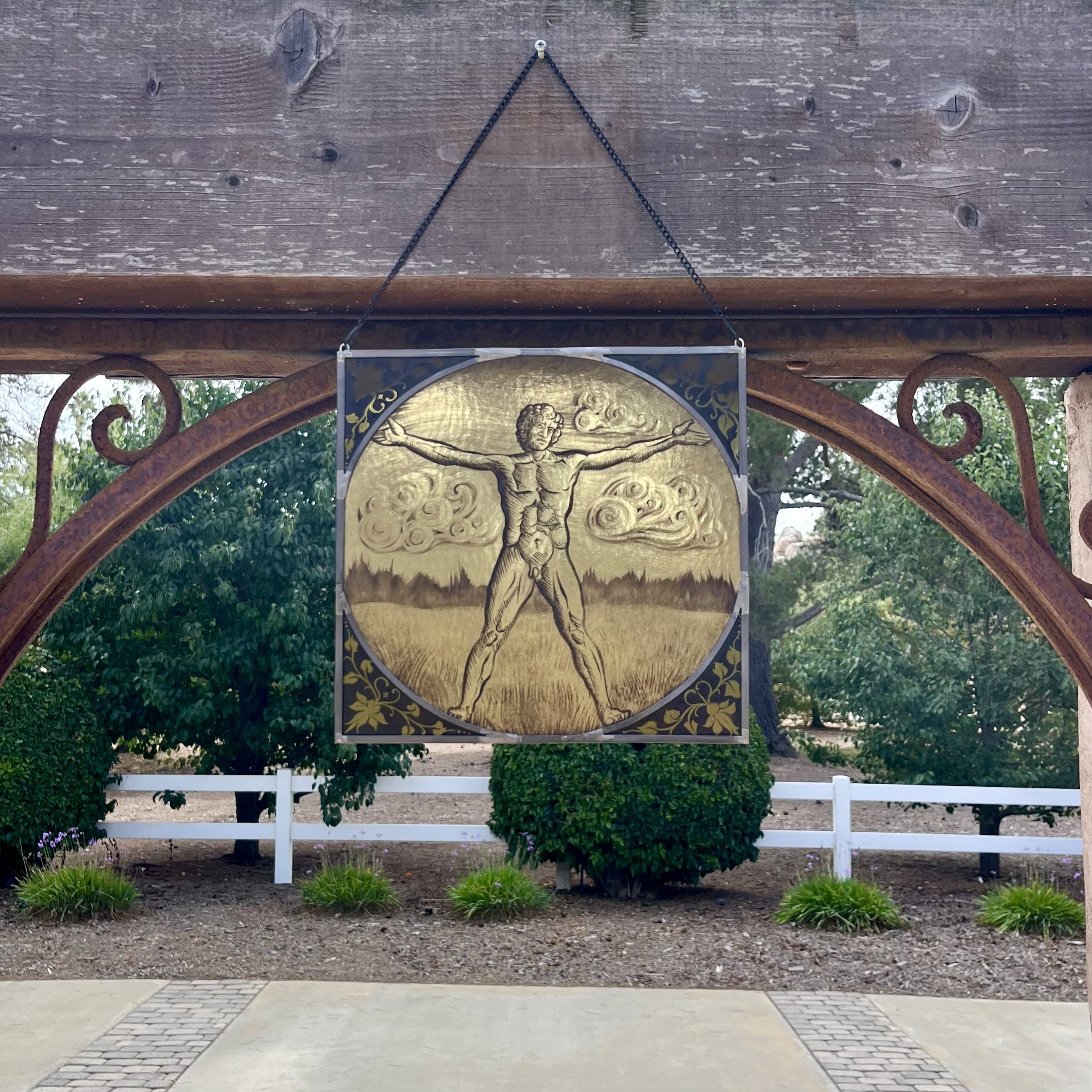 Vitruvian Stained Glass Hanging.jpeg