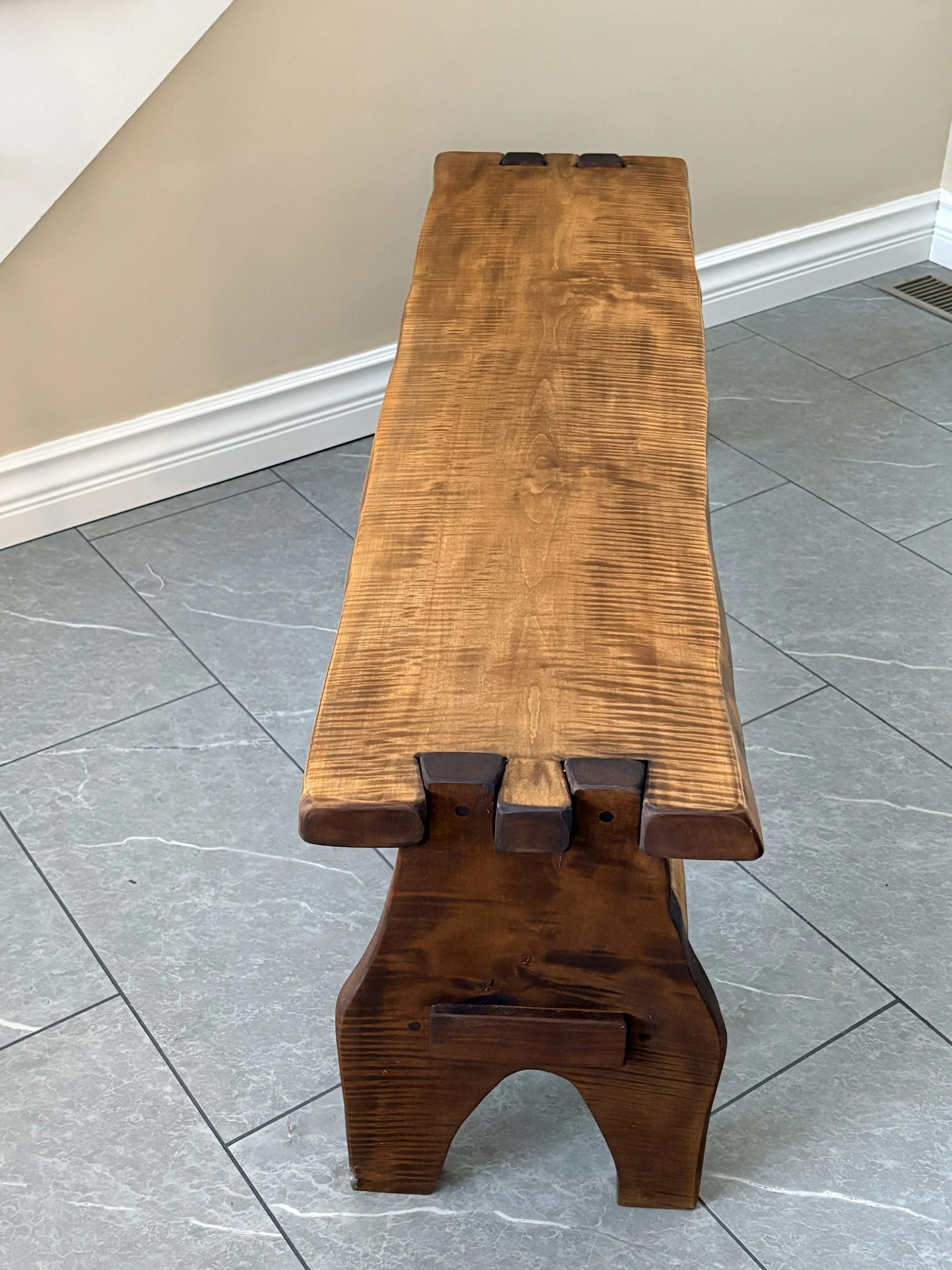 curly bench in hall from side.jpeg