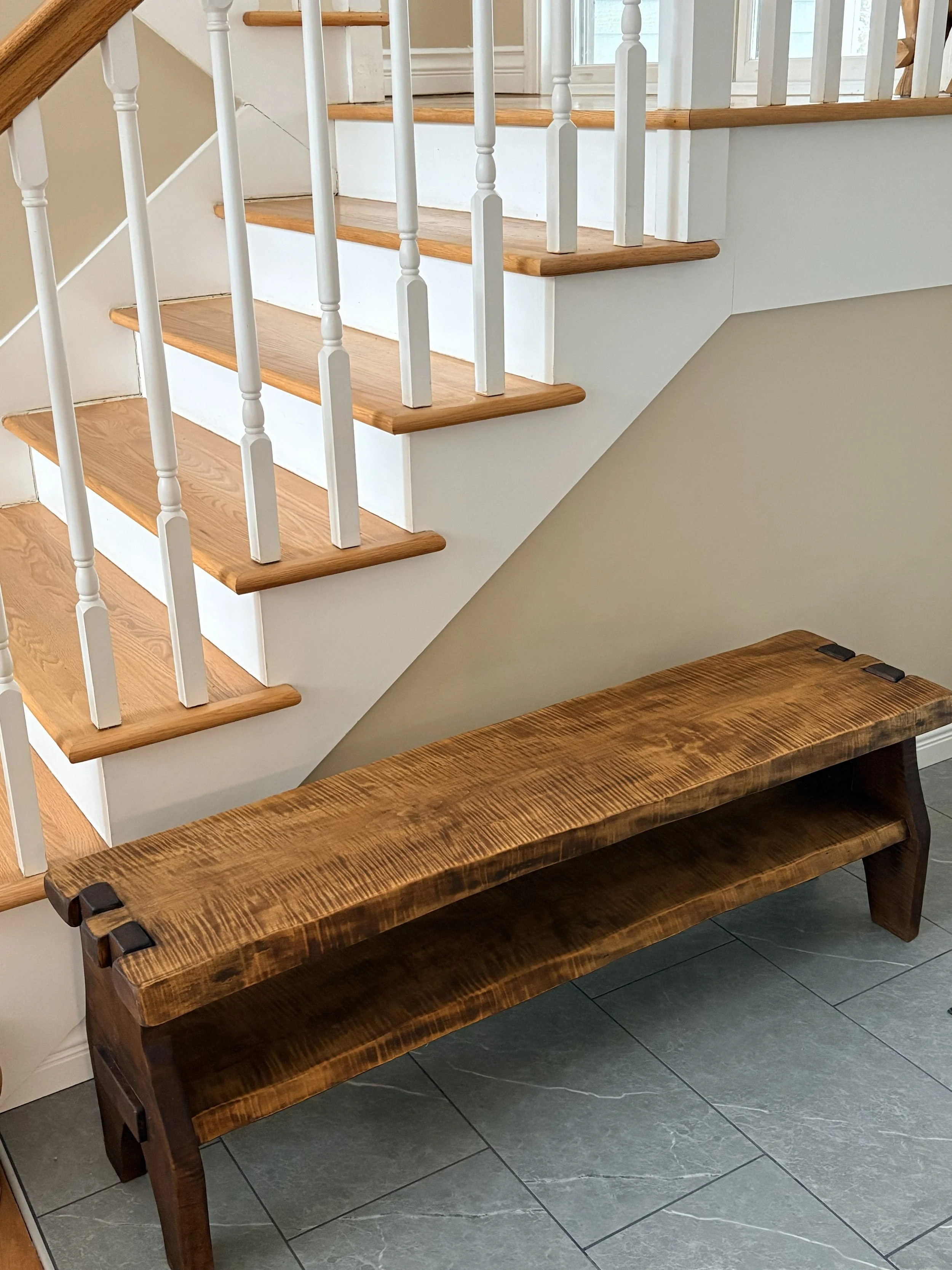 curly bench in hall.jpeg