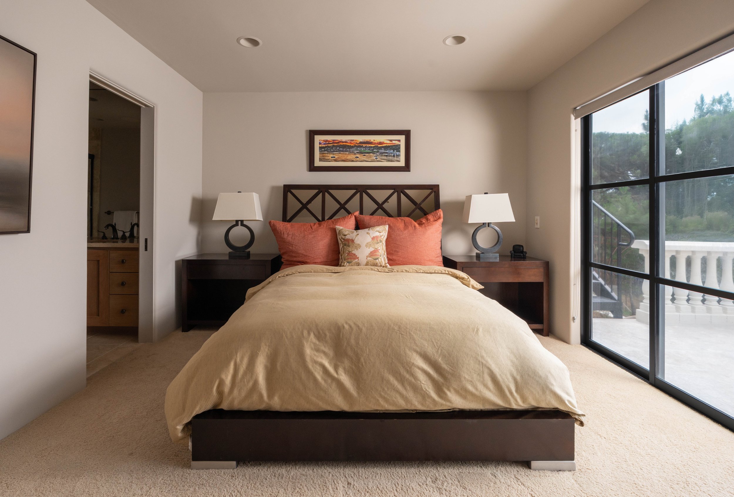 Downstairs bedroom #3. Sliding door to lower balcony.