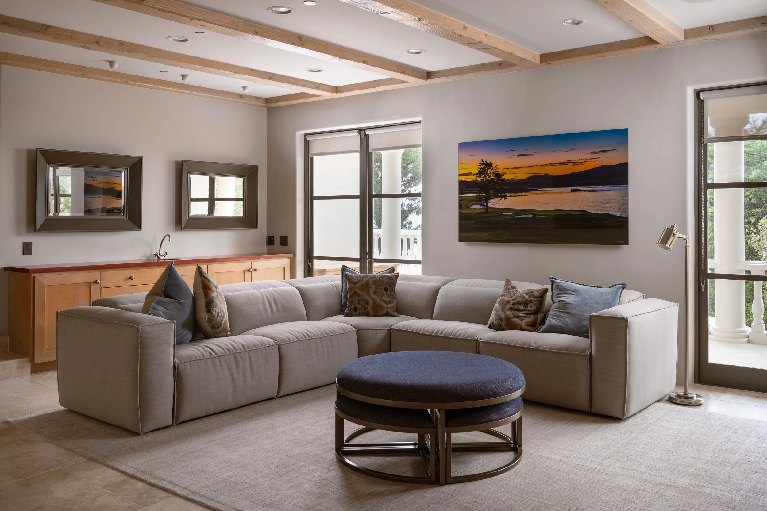 Downstairs entertainment room. Features large flat screen TV and rear bar. Perfect for movies or watching games.