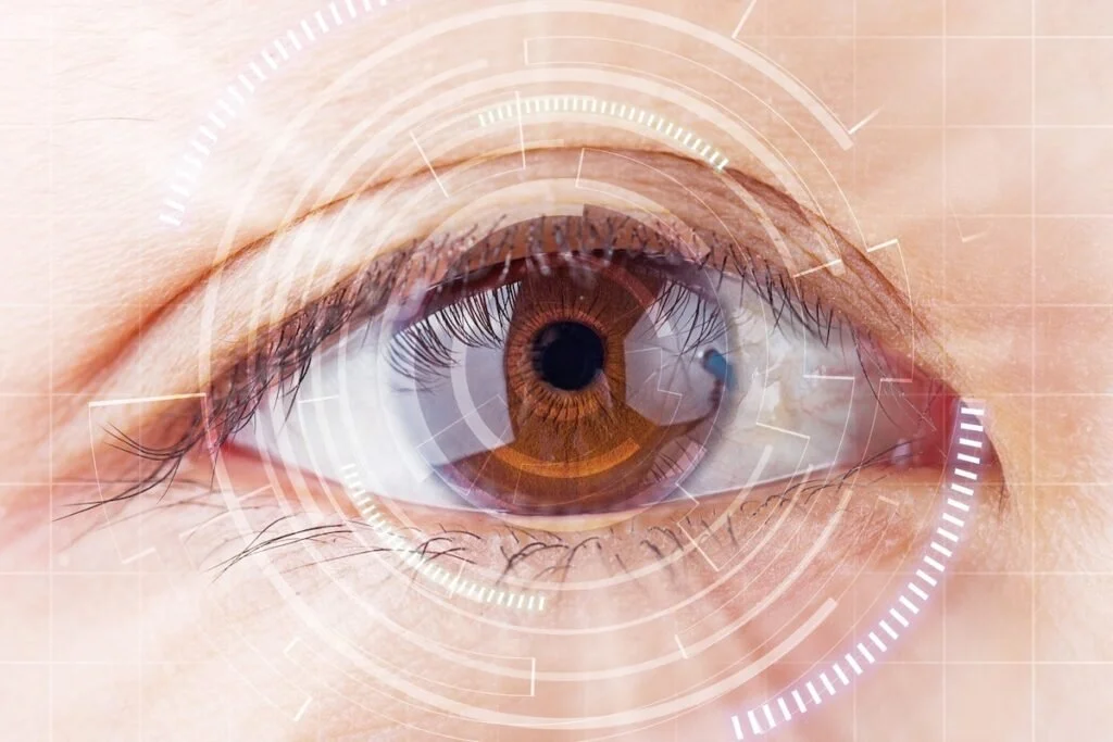 Close-up of a human eye with a digital overlay and HUD interface elements.